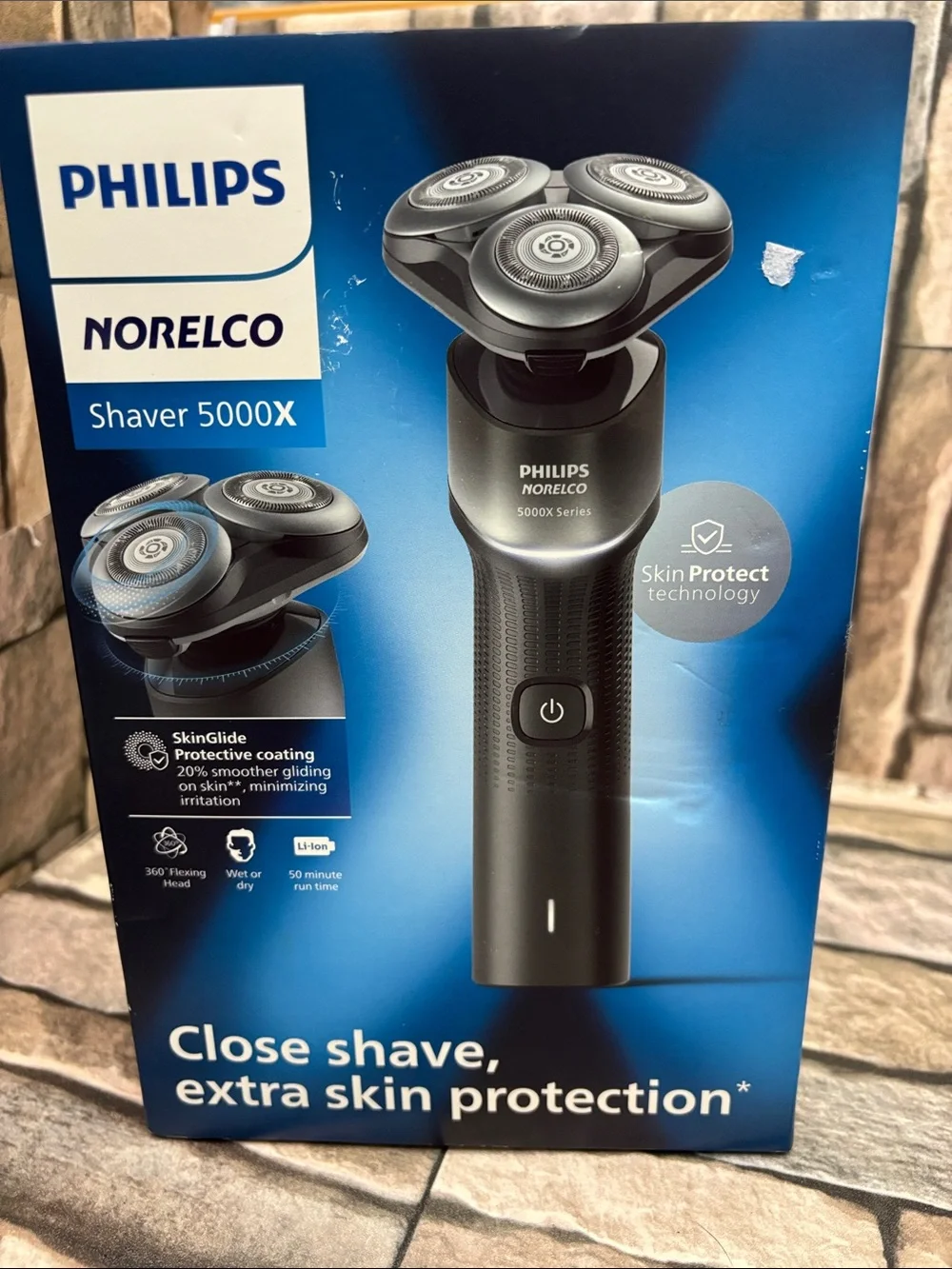 New Philips Norelco Shaver 5000X wet and dry electric shaver.